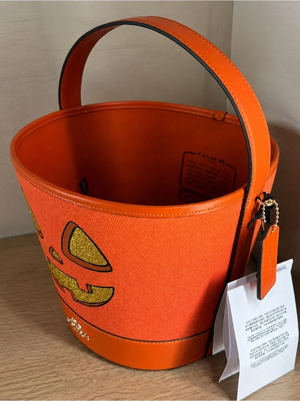 COACH Kids Orange Glitter Jack-O'-Lantern Bucket Bag